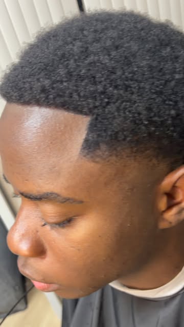 A sharp Dapper Man barbering finish, ready for the day